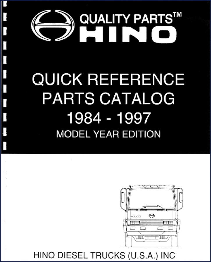 Hino DG550 Parts Catalog 1984-1997 factory manual cover on workbench with open pages showing brake system diagrams